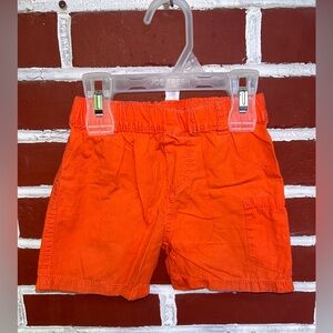 Gagou Tagou | orange cotton shorts | size 24m